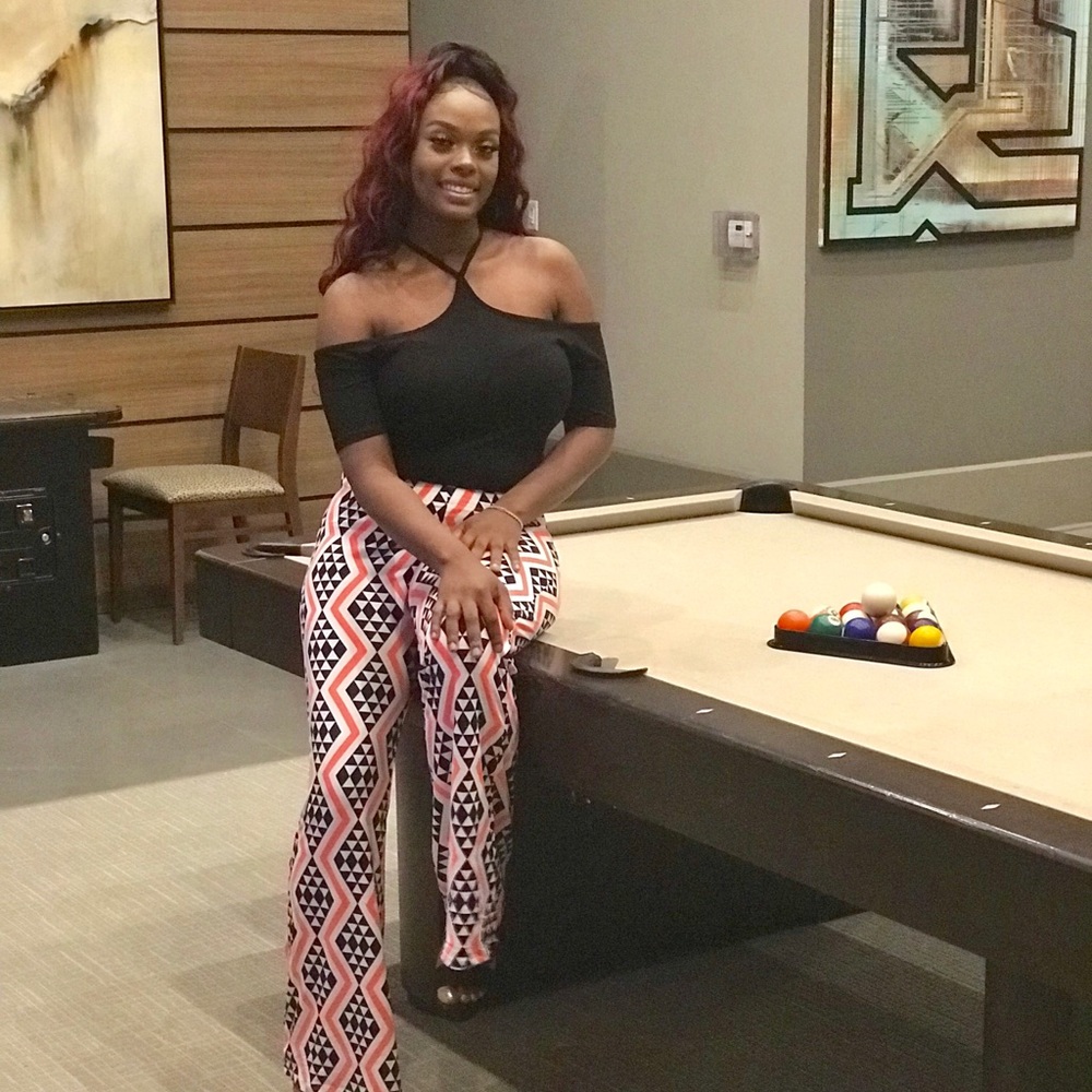 Coral print flare pants with off the shoulders top